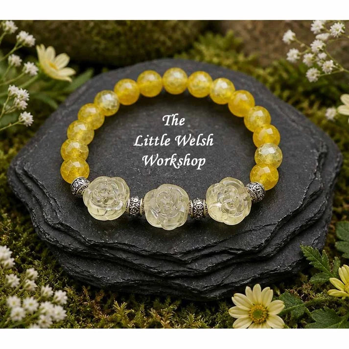 Yellow dragons vein (8mm) with 3 glass flower beads