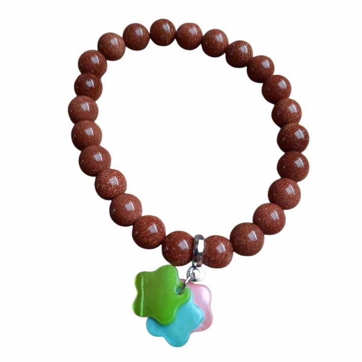Goldstone (Sandstone) (8mm) with 3 shell charms